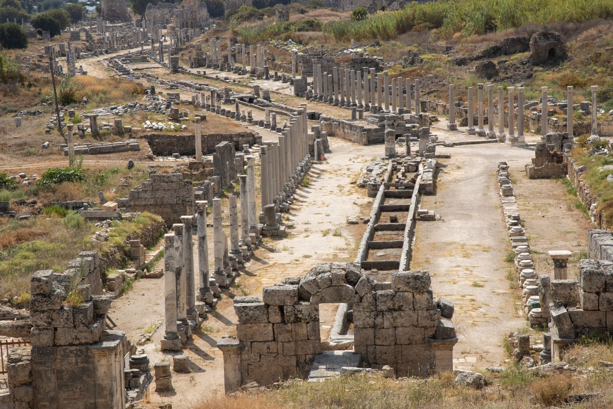 The long colonnaded street of Perge ancient city, lined with rows of stone columns